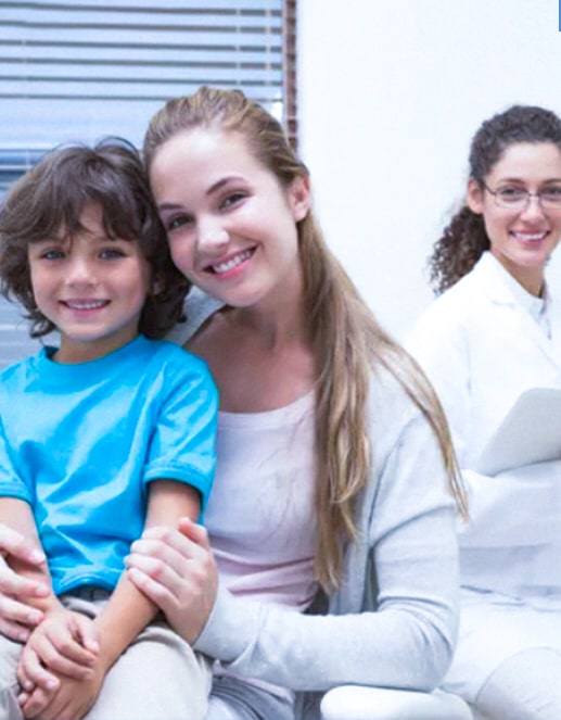 Mother and son in a dental office